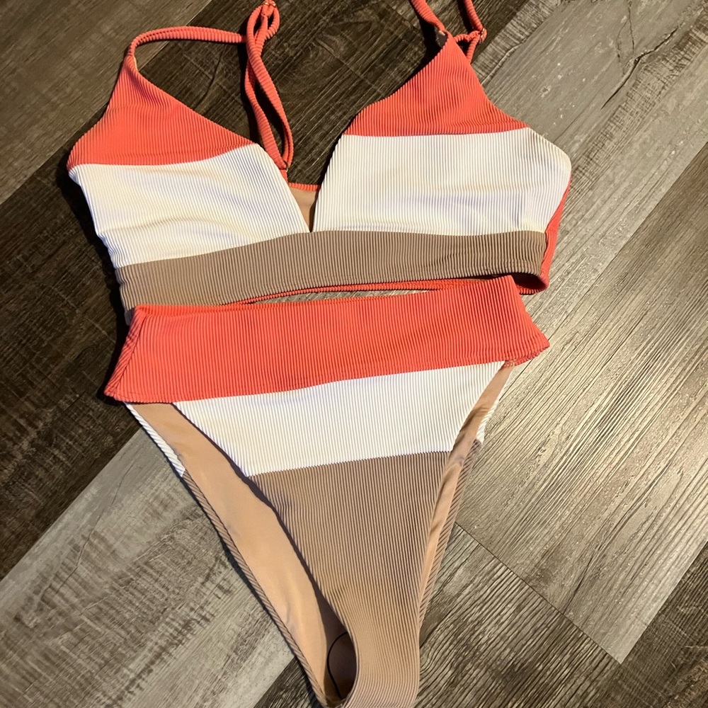Small selling as a set . New without tags beach riot bikini